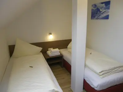 Ein Bett oder Betten in einem Zimmer der Unterkunft Appartement Großwallner