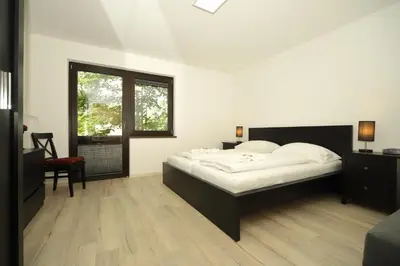 Ein Bett oder Betten in einem Zimmer der Unterkunft Haus Schroffenstein