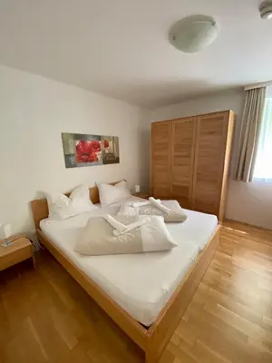 Ein Bett oder Betten in einem Zimmer der Unterkunft Obertauern Fewo Alps -Top 11 by Kamper