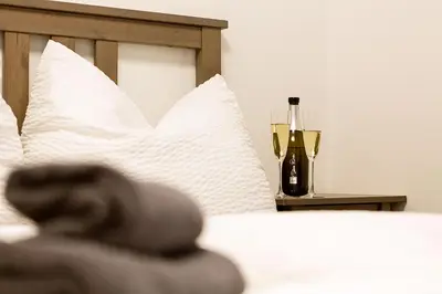 Ein Bett oder Betten in einem Zimmer der Unterkunft Apartment Schafbergblick mit Balkon