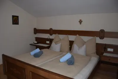 Ein Bett oder Betten in einem Zimmer der Unterkunft Ferienhaus Bergblick