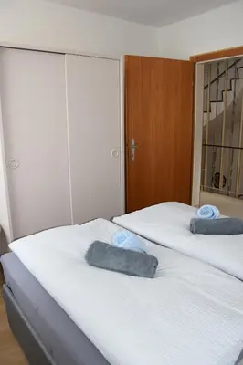 Ein Bett oder Betten in einem Zimmer der Unterkunft Ferienhaus Bergblick