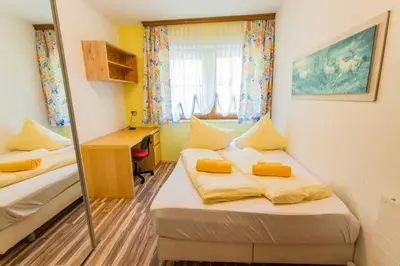Ein Bett oder Betten in einem Zimmer der Unterkunft Huberhof 1 by Alpenidyll Apartments