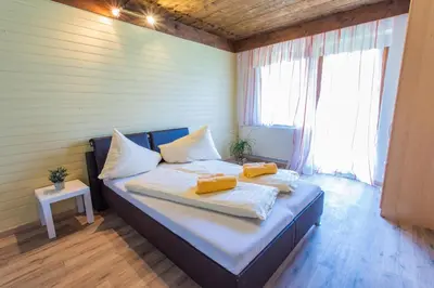 Ein Bett oder Betten in einem Zimmer der Unterkunft Huberhof 2 by Alpenidyll Apartments