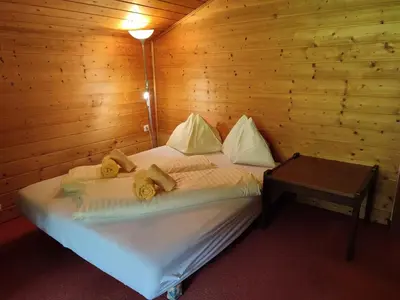 Ein Bett oder Betten in einem Zimmer der Unterkunft Huberhof 8 by Alpenidyll Apartments