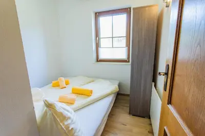 Ein Bett oder Betten in einem Zimmer der Unterkunft Huberhof 9 by Alpenidyll Apartments