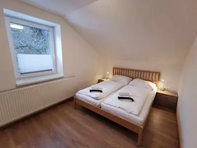 Ein Bett oder Betten in einem Zimmer der Unterkunft Müller Apartment