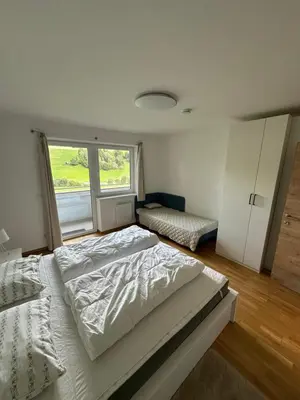 Ein Bett oder Betten in einem Zimmer der Unterkunft Cozy apartment in the Lungau region.