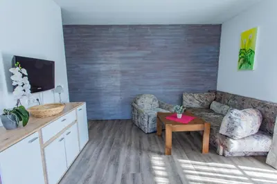 Ein Sitzbereich in der Unterkunft Huberhof 5 by Alpenidyll Apartments