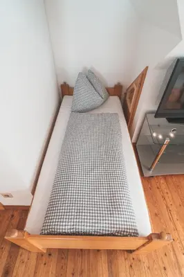 Ein Bett oder Betten in einem Zimmer der Unterkunft Putterer Stadl