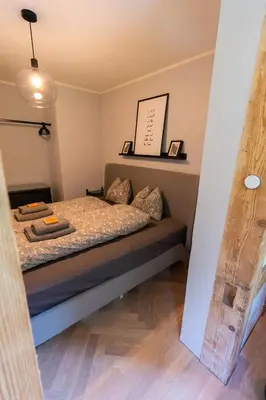 Ein Bett oder Betten in einem Zimmer der Unterkunft Apartment in historischer Villa mit Parkplatz