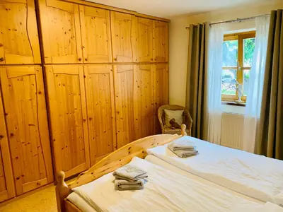 Ein Bett oder Betten in einem Zimmer der Unterkunft Ferienwohnung Stadlmann