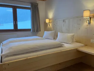 Ein Bett oder Betten in einem Zimmer der Unterkunft Apartment Obergruberhof