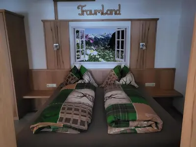 Ein Bett oder Betten in einem Zimmer der Unterkunft Saumerhof