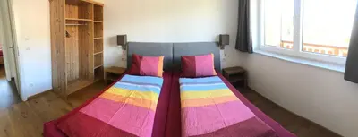 Ein Bett oder Betten in einem Zimmer der Unterkunft Appartement Grossegger