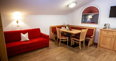 Ein Sitzbereich in der Unterkunft Appartement-Gästehaus Ursula