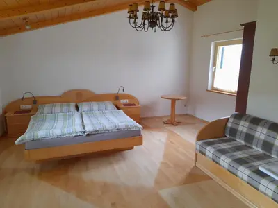 Ein Bett oder Betten in einem Zimmer der Unterkunft Ferienhaus Reiter