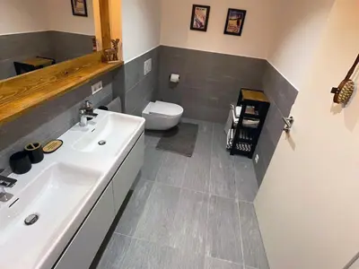Ein Badezimmer in der Unterkunft Alpenblick Apartment