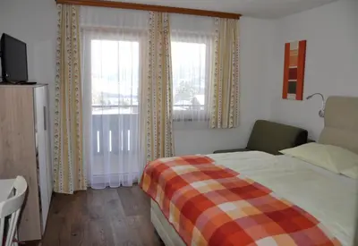 Ein Bett oder Betten in einem Zimmer der Unterkunft Haus Kocher