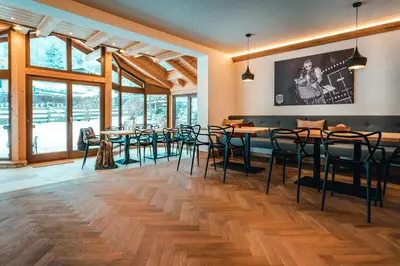 Ein Restaurant oder anderes Speiselokal in der Unterkunft Haus Ennsegg by Schladming-Appartements