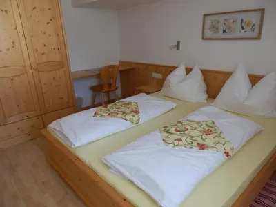 Ein Bett oder Betten in einem Zimmer der Unterkunft Haus Sonnental