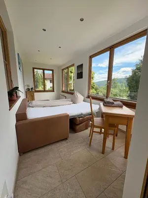 Ein Bett oder Betten in einem Zimmer der Unterkunft Villa Hansalhof, Wohnung Rosenduft