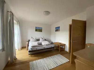 Ein Bett oder Betten in einem Zimmer der Unterkunft Villa Hansalhof, Wohnung Rosenduft