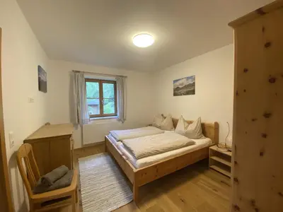 Ein Bett oder Betten in einem Zimmer der Unterkunft Villa Hansalhof, Wohnung Rosenduft