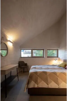Ein Bett oder Betten in einem Zimmer der Unterkunft Chalet Dachstein