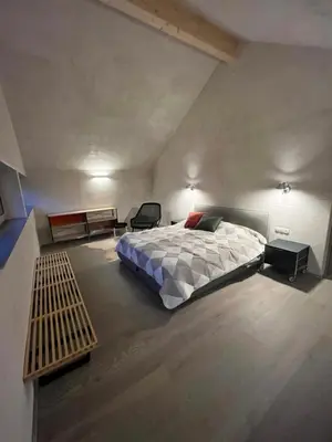Ein Bett oder Betten in einem Zimmer der Unterkunft Chalet Dachstein