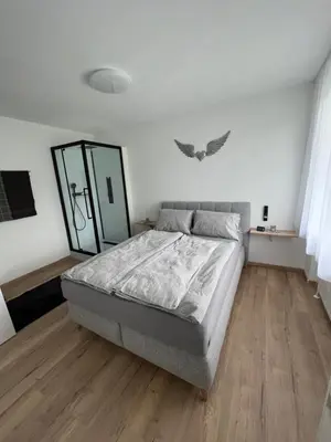 Ein Bett oder Betten in einem Zimmer der Unterkunft BacherlHouse - Apt Steinbach