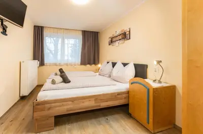 Ein Bett oder Betten in einem Zimmer der Unterkunft Toni`s Appartement by Schladming-Appartements