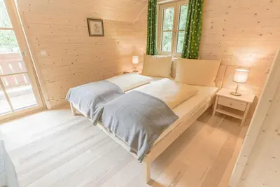 Ein Bett oder Betten in einem Zimmer der Unterkunft Forsthaus Toplitzsee