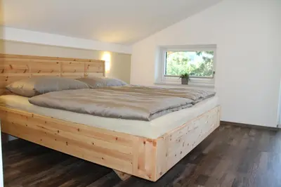 Ein Bett oder Betten in einem Zimmer der Unterkunft Top-Apartment Pfarrwerfen