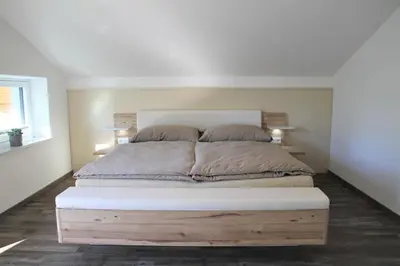 Ein Bett oder Betten in einem Zimmer der Unterkunft Top-Apartment Pfarrwerfen