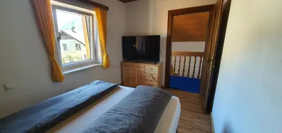 Ein Bett oder Betten in einem Zimmer der Unterkunft Ferienwohnung Brader