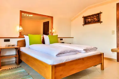 Ein Bett oder Betten in einem Zimmer der Unterkunft Hotel Pension Residence