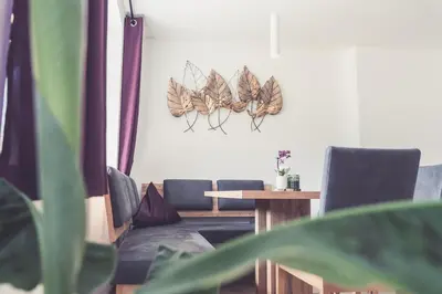 Ein Sitzbereich in der Unterkunft Apartments z‘Haus