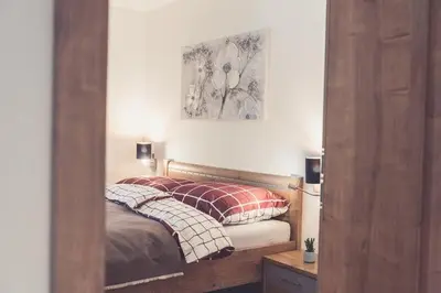 Ein Bett oder Betten in einem Zimmer der Unterkunft Apartments z‘Haus