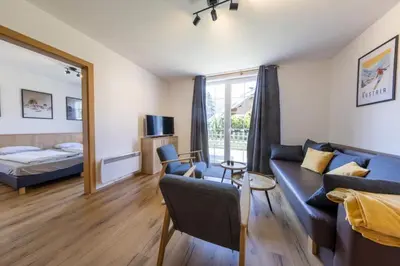 Ein Bett oder Betten in einem Zimmer der Unterkunft Haus Aineckblick Top 2