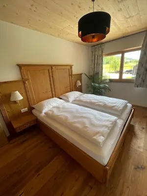 Ein Bett oder Betten in einem Zimmer der Unterkunft Apartment Goaßa - Familie Zehner