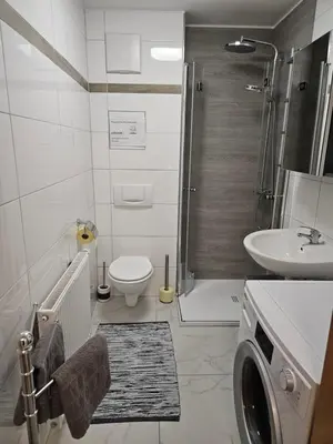 Ein Badezimmer in der Unterkunft Ferienwohnung Grimmingblick - Auszeit vom Alltag