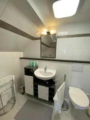 Ein Badezimmer in der Unterkunft Ferienwohnung Grimmingblick - Auszeit vom Alltag