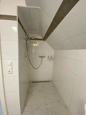 Ein Badezimmer in der Unterkunft Ferienwohnung Grimmingblick - Auszeit vom Alltag