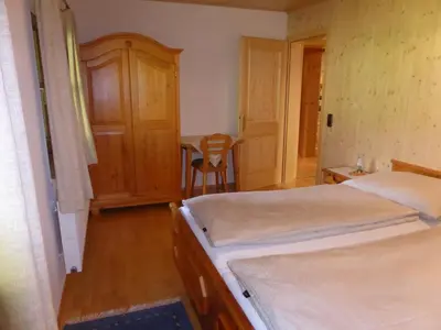 Ein Bett oder Betten in einem Zimmer der Unterkunft Haus Hütter