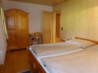 Ein Bett oder Betten in einem Zimmer der Unterkunft Haus Hütter