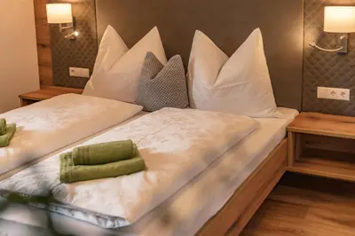Ein Bett oder Betten in einem Zimmer der Unterkunft Appartements Die Ramsauerin
