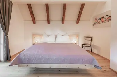 Ein Bett oder Betten in einem Zimmer der Unterkunft Xeishittn VogelNest