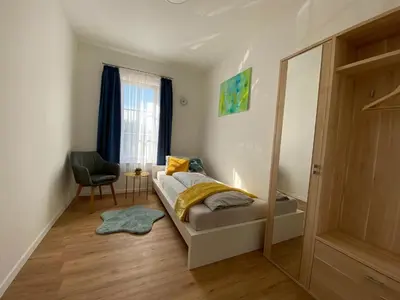 Ein Bett oder Betten in einem Zimmer der Unterkunft Residence JORADO