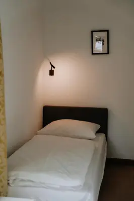 Ein Bett oder Betten in einem Zimmer der Unterkunft Appartement Zentrum